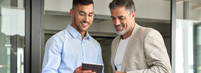 construction business manager reviewing report from expert witness