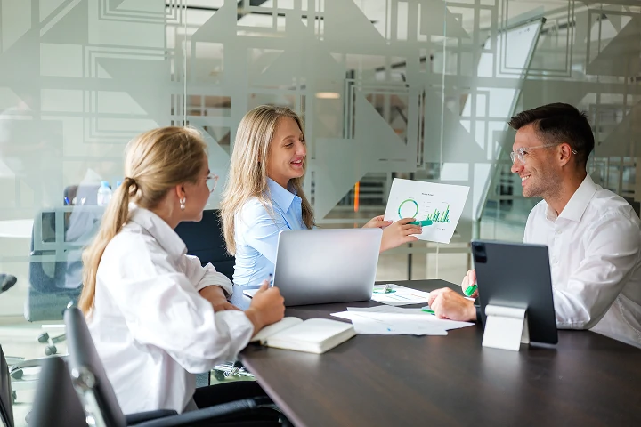 going over financial reports with construction company and experienced consultant
